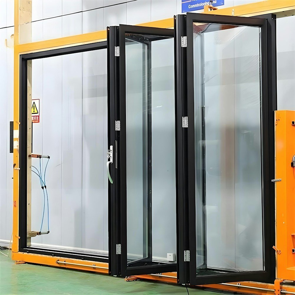 Black-framed folding glass doors